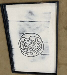A sand drawing containing the completed ‘reconciliation’ pattern
