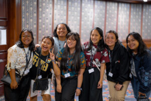 Students from Asia smiling